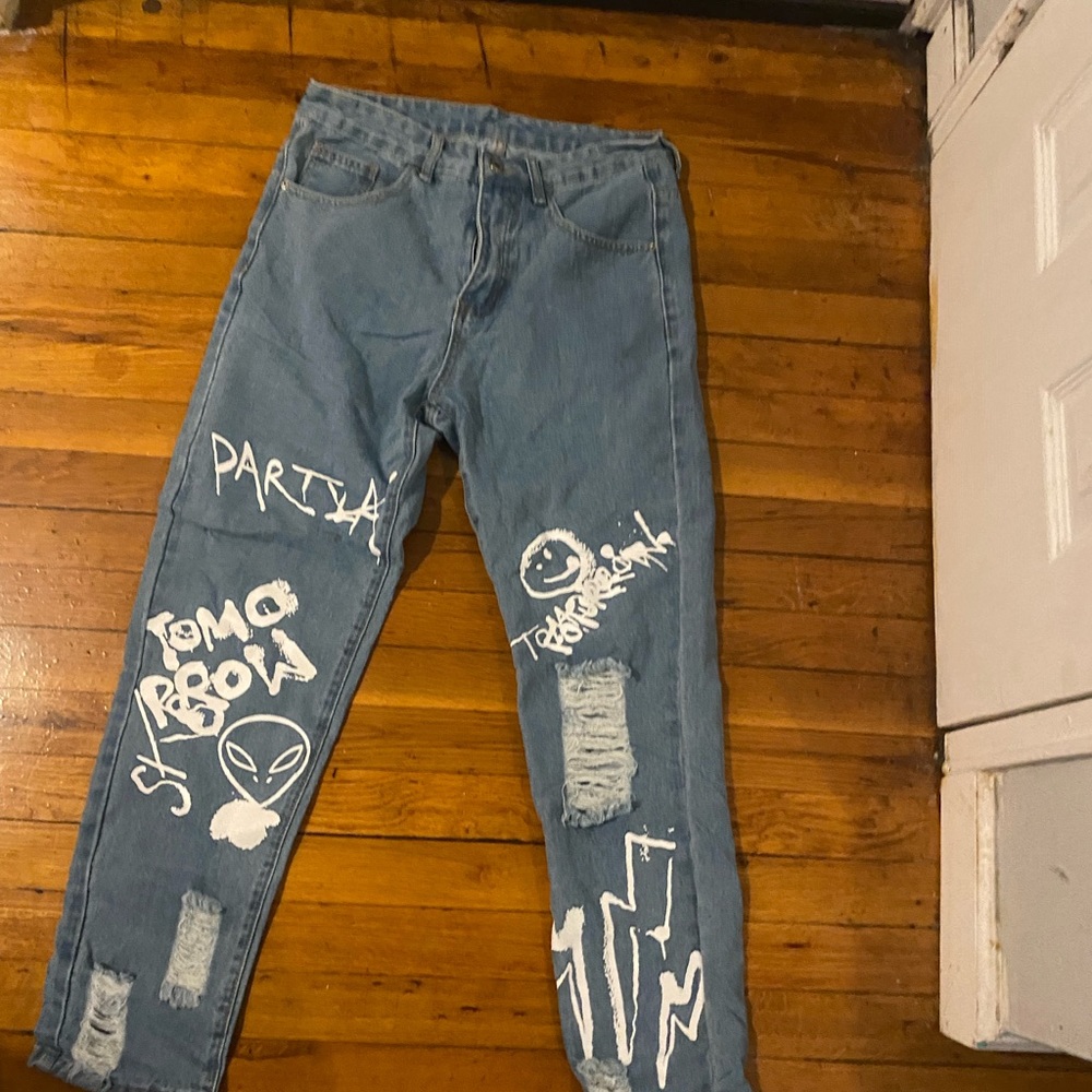 Blue jeans with white graphics